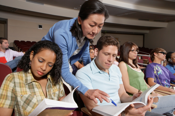 Professor helping students